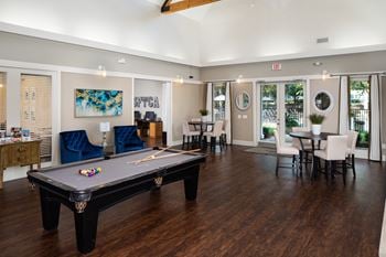 Clubroom with billiards table